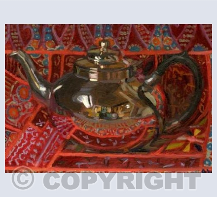 Silver teapot on Indian Cloth