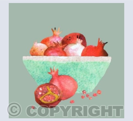 Pomegranates on green