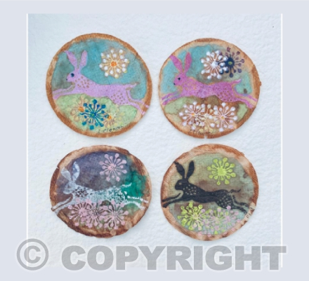 Four leaping hares