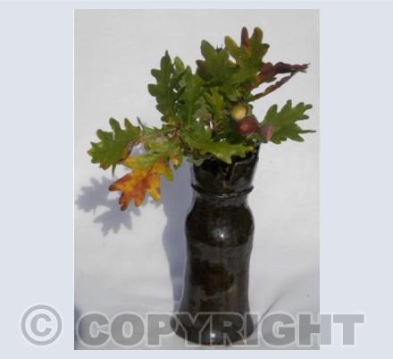 Dress vase with oak leaves